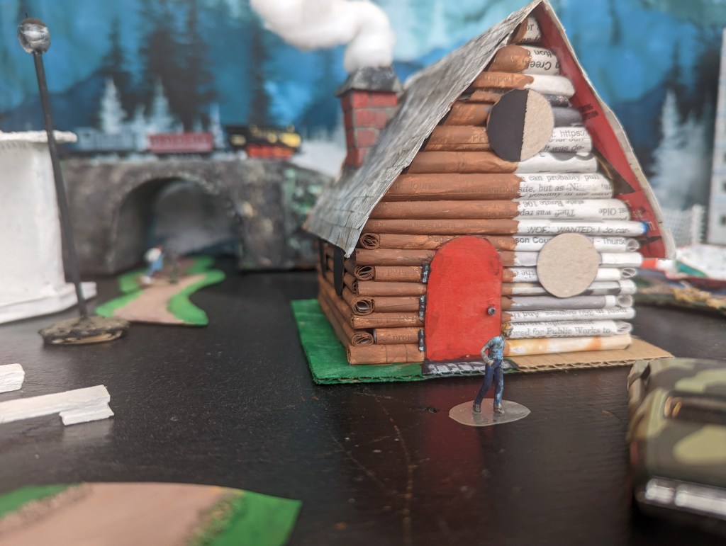 Log Cabin tutorial - made from recycled materials.